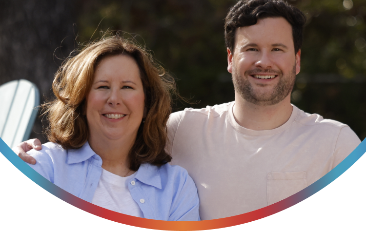 Two people smiling